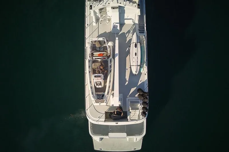 Slide: The Image of Aerial view of 2000 Northern Marine 75 yacht on calm water. - 69