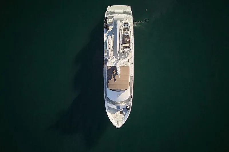 Slide: The Image of Aerial view of 2000 Northern Marine 75 yacht on calm water. - 78