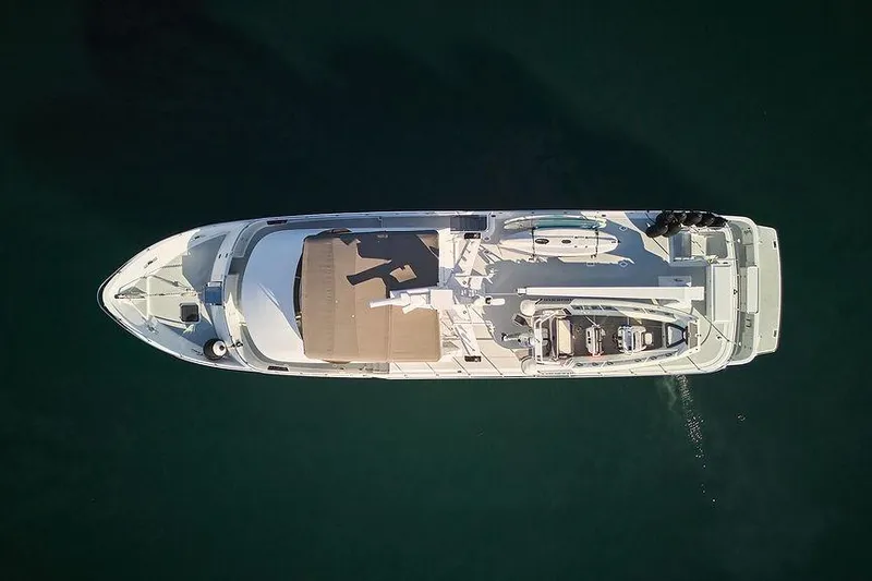 Slide: The Image of Aerial view of 2000 Northern Marine 75 yacht on calm water. - 79