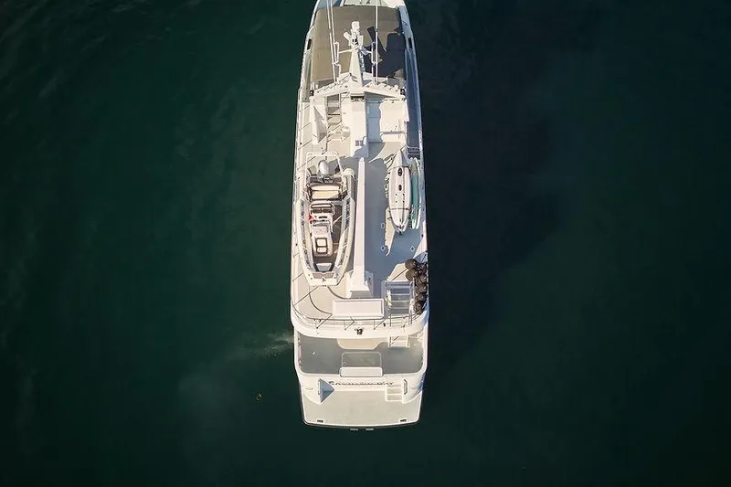 Slide: The Image of Aerial view of 2000 Northern Marine 75 yacht on calm water. - 80