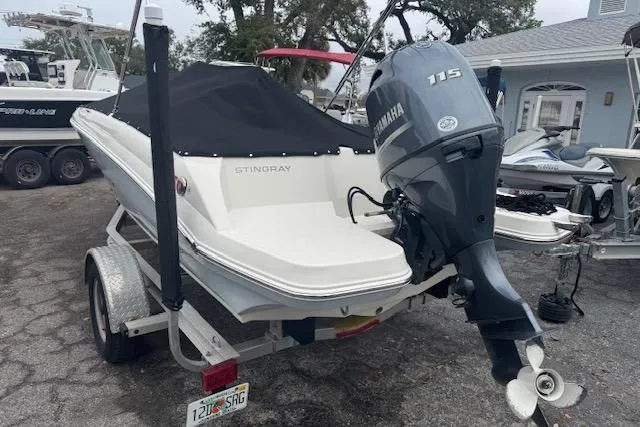 Slide: The Image of 2023 Stingray 182 SC boat with Yamaha 115 engine on trailer. - 10