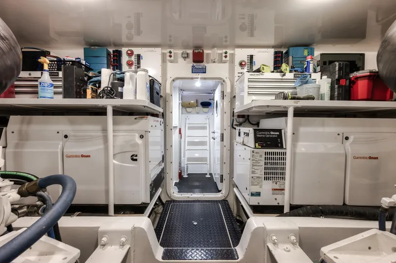 Slide: The Image of Engine room of 2012 Viking 70 Enclosed Bridge yacht with Cummins Onan generators. - 106