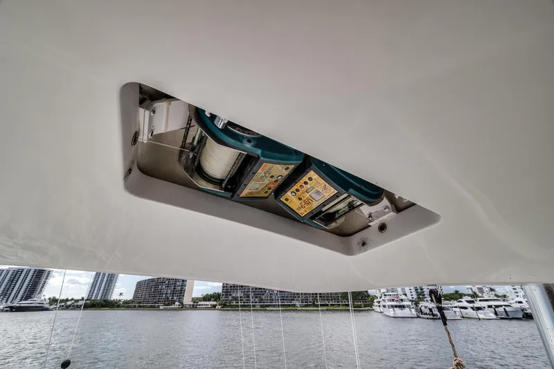 Slide: The Image of 2012 Viking 70 Enclosed Bridge yacht winch system with waterfront view. - 43