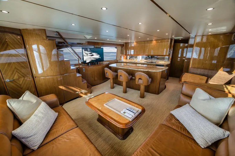 Slide: The Image of Luxurious interior of 2012 Viking 70 Enclosed Bridge yacht with elegant wood finishes. - 53