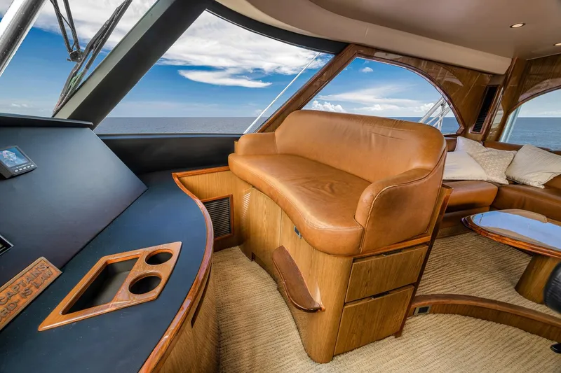 Slide: The Image of Luxurious interior of 2012 Viking 70 Enclosed Bridge yacht with ocean view. - 68
