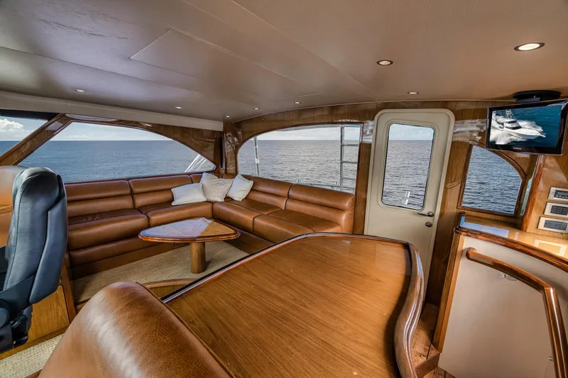 Slide: The Image of Luxurious interior of 2012 Viking 70 Enclosed Bridge yacht with ocean view. - 69