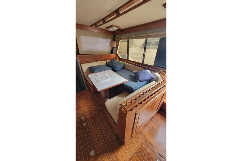 Slide: The Image of Wicker seating with blue cushions on 1984 Kha Shing 40 Spindrift yacht deck. - 10
