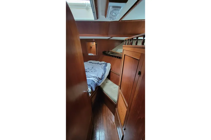 Slide: The Image of Helm of 1984 Kha Shing 40 Spindrift yacht with steering wheel and navigation instruments. - 16