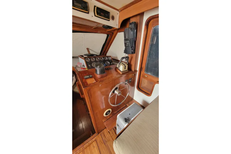 Slide: The Image of 1984 Kha Shing 40 Spindrift yacht with sleek design and spacious deck. - 5