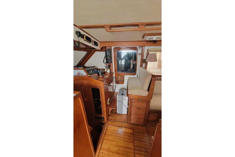 Slide: The Image of Inflatable dinghy beside 1984 Kha Shing 40 Spindrift yacht on dry dock. - 8