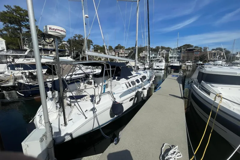 The Image of Sailboat on water, 1999 Hunter 460 model, clear blue sky background. - 0