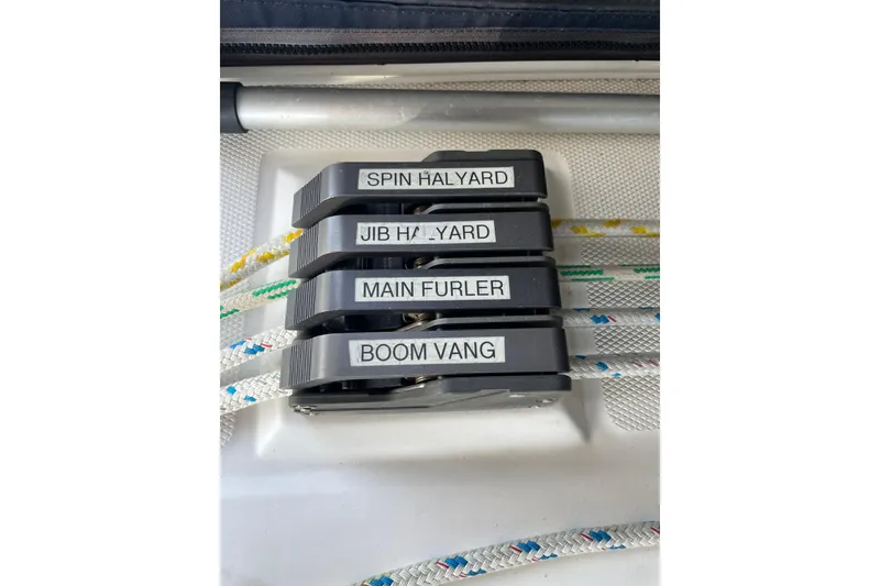 Slide: The Image of White panel with a circular hatch on a 1999 Hunter 460 boat. - 20