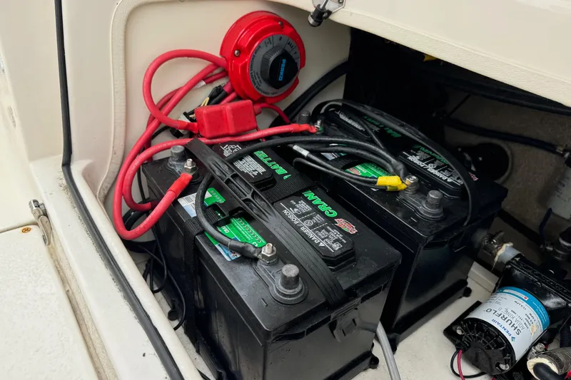 Slide: The Image of 2019 Sea Chaser 24 HFC boat battery compartment with wiring and components. - 20