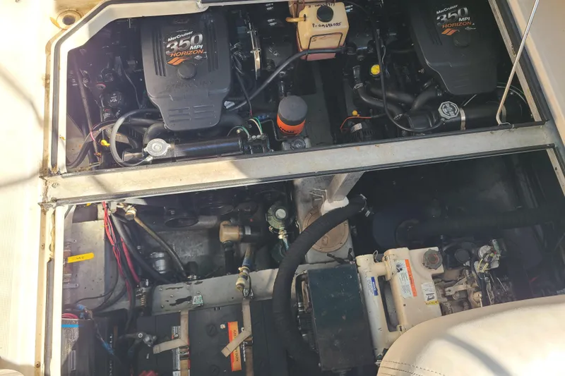 Slide: The Image of Engine compartment of a 1996 Regal Commodore 292 with dual MerCruiser 350 MPI Horizon engines. - 25