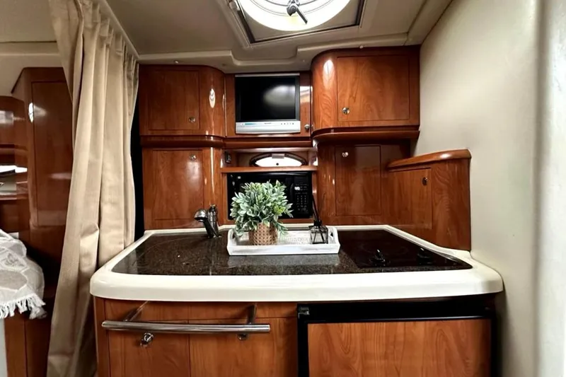 Slide: The Image of Aerial view of a 2006 Four Winns 348 Vista yacht on the water. - 14