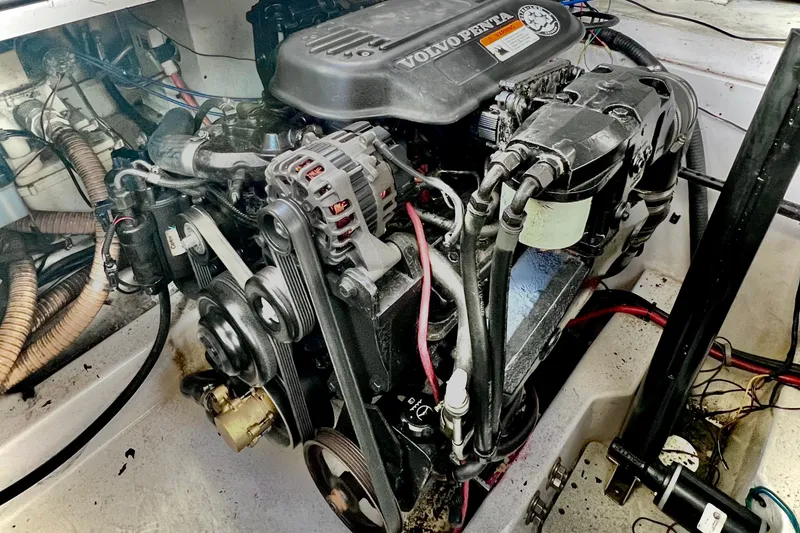 Slide: The Image of Engine of a 2006 Four Winns 348 Vista boat, featuring Volvo Penta components. - 47
