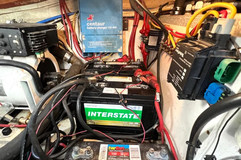 Slide: The Image of Electrical system of a 2006 Four Winns 348 Vista boat with batteries and wiring. - 50