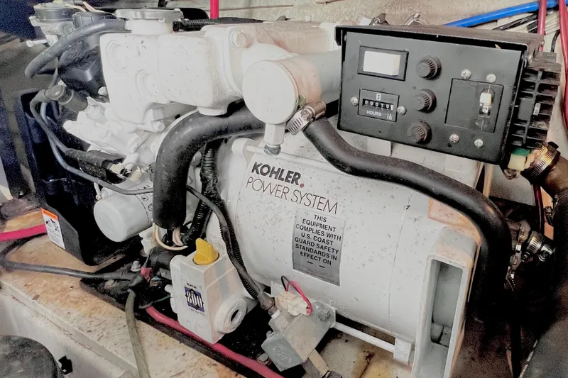 Slide: The Image of Engine compartment of 2006 Four Winns 348 Vista with Kohler power system. - 51