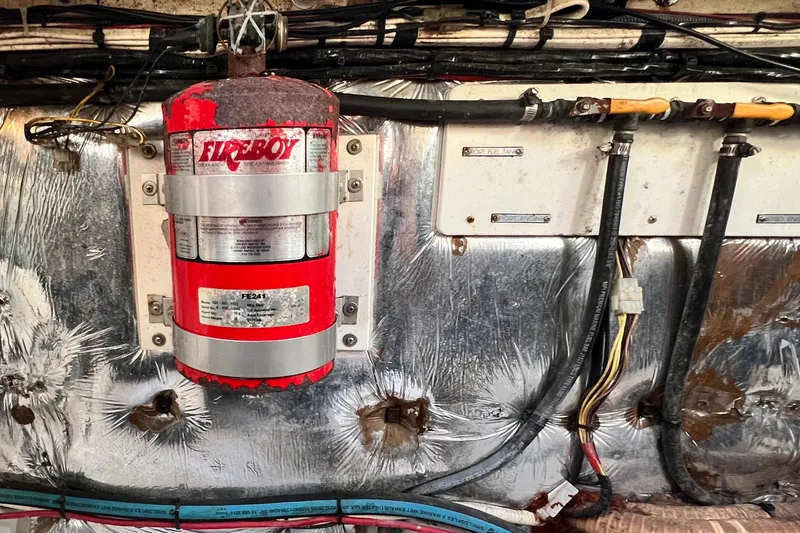 Slide: The Image of Engine room of 2006 Four Winns 348 Vista with Fireboy fire extinguisher system. - 57