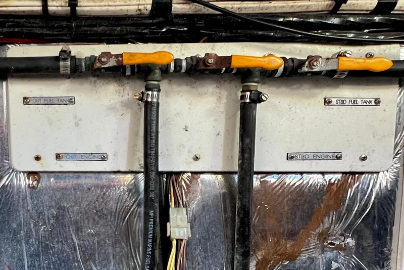 Slide: The Image of Fuel system valves on a 2006 Four Winns 348 Vista boat. - 58