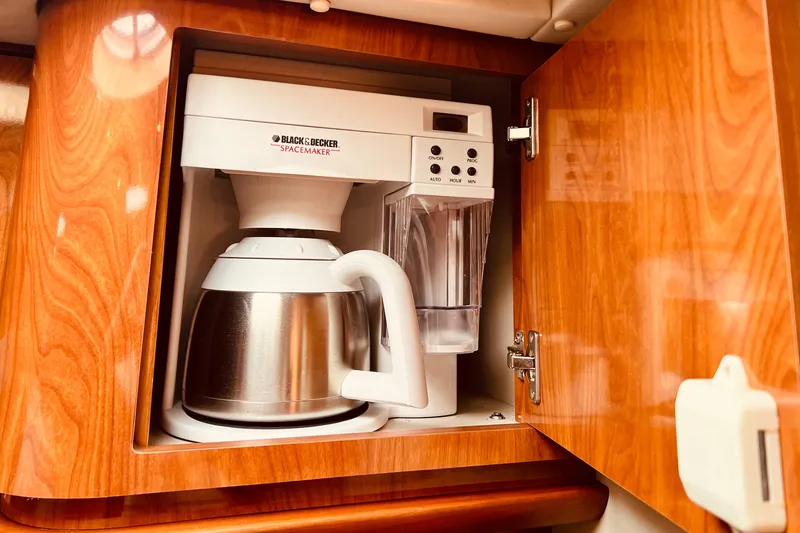 Slide: The Image of Coffee maker in wooden cabinet on 2006 Four Winns 348 Vista boat. - 69