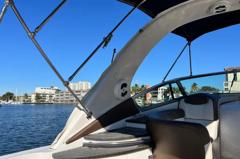 Slide: The Image of 2006 Four Winns 348 Vista boat interior with waterfront view and clear blue sky. - 73