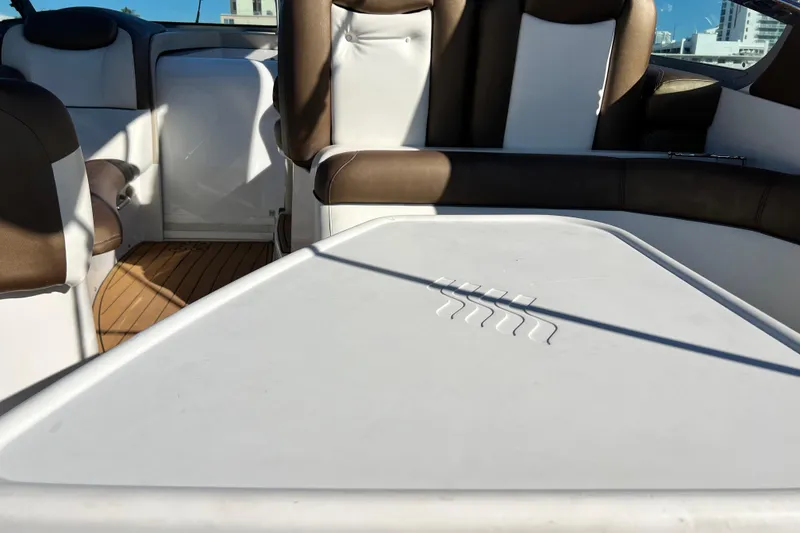 Slide: The Image of 2006 Four Winns 348 Vista boat interior with white and brown seating. - 75