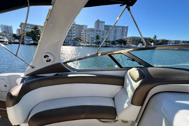 Slide: The Image of 2006 Four Winns 348 Vista yacht interior with waterfront view and modern seating. - 92