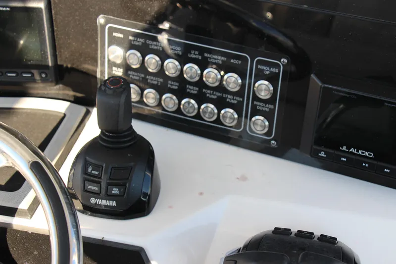 Slide: The Image of Control panel of 2020 Sea Fox 328 Commander with Yamaha joystick and JL Audio system. - 12