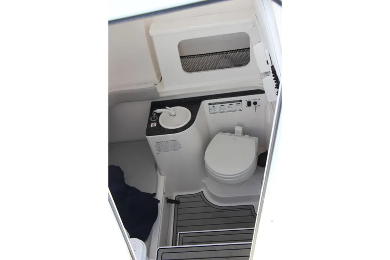 Slide: The Image of 2020 Sea Fox 328 Commander boat interior with toilet and sink. - 13