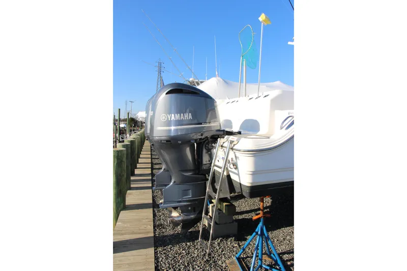 Slide: The Image of Sea Fox 328 Commander 2020 with Yamaha outboard motor on a dock. - 3