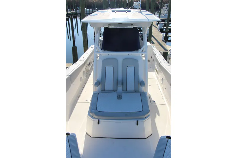 Slide: The Image of 2020 Sea Fox 328 Commander boat interior with seating and helm station. - 8