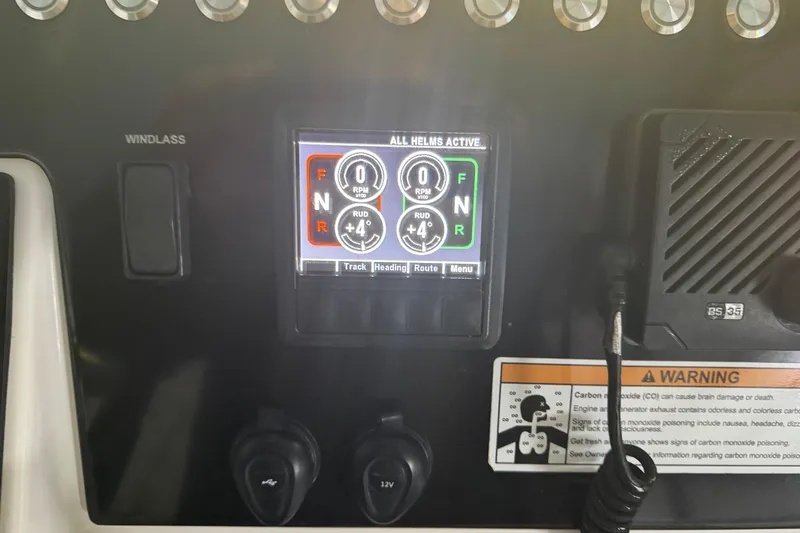 Slide: The Image of Control panel of a 2019 Fountain 38 Center Console boat with digital display. - 11