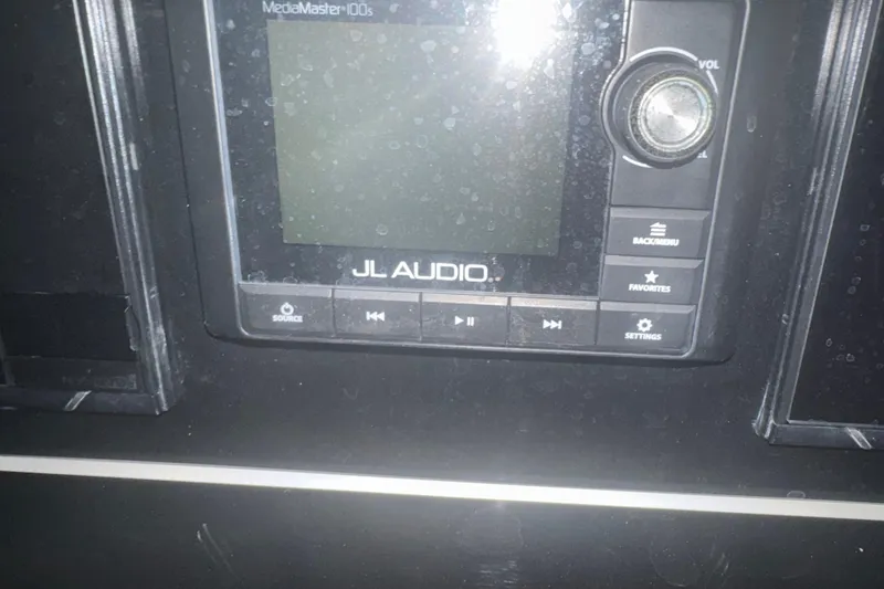 Slide: The Image of JL Audio MediaMaster 100s control panel on 2019 Fountain 38 Center Console boat. - 21