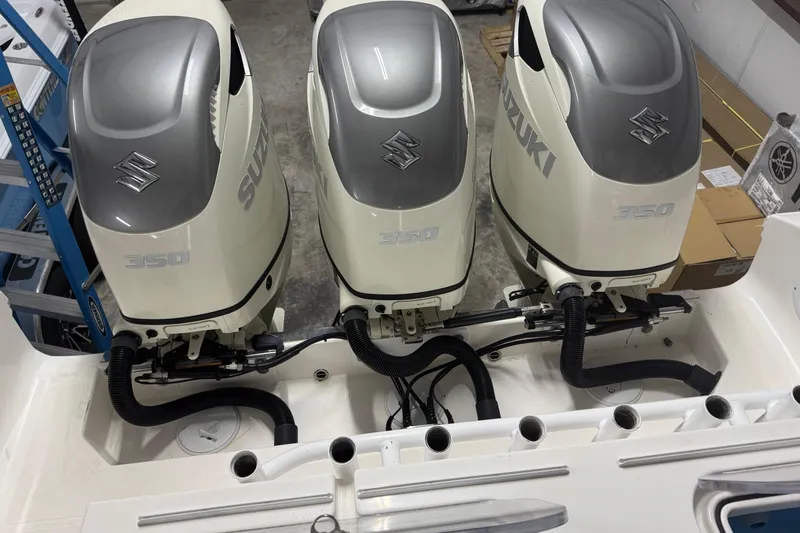 Slide: The Image of Triple Suzuki 350 outboard engines on a 2019 Fountain 38 Center Console boat. - 24