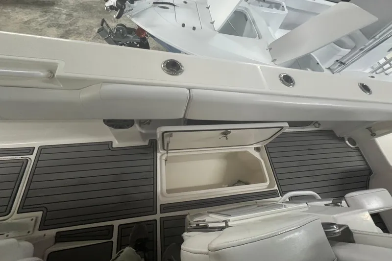 Slide: The Image of 2019 Fountain 38 Center Console boat interior with open storage compartment. - 39