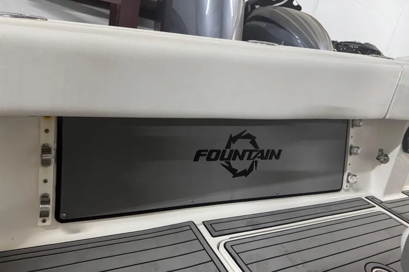 Slide: The Image of 2019 Fountain 38 Center Console boat interior with logo and sleek design. - 46