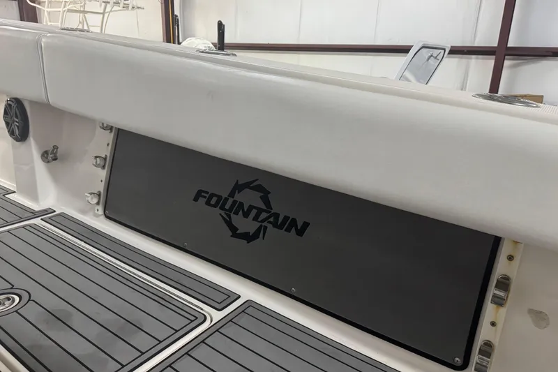 Slide: The Image of 2019 Fountain 38 Center Console boat interior with logo and sleek design. - 47