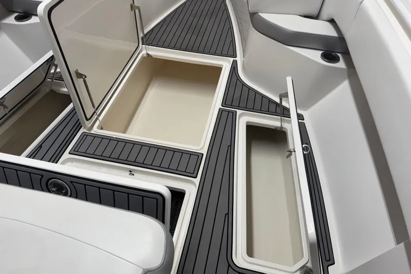 Slide: The Image of 2019 Fountain 38 Center Console boat with open storage compartments and sleek deck design. - 56
