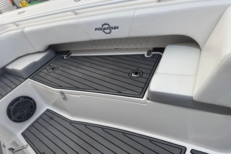 Slide: The Image of 2019 Fountain 38 Center Console boat interior with sleek seating and non-slip flooring. - 59