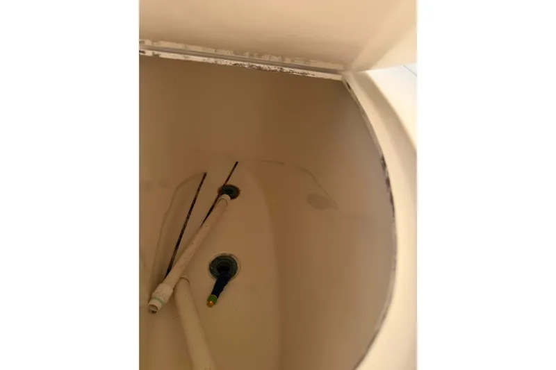 Slide: The Image of Interior view of a 2008 Henriques 30 Express boat compartment. - 13