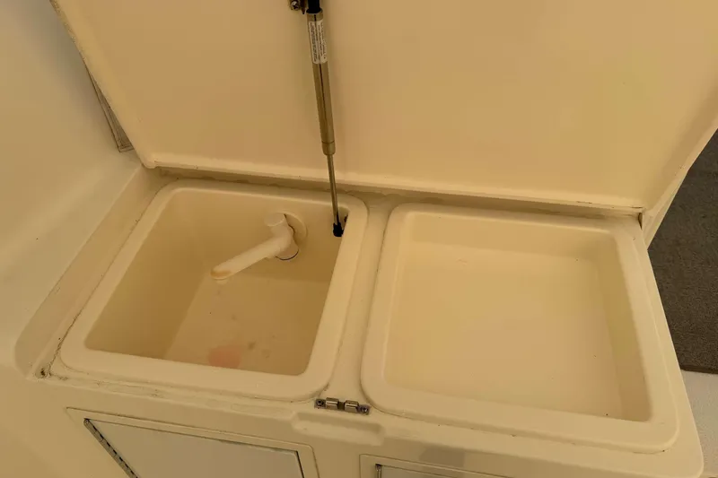 Slide: The Image of Dual sink setup on 2008 Henriques 30 Express boat. - 27