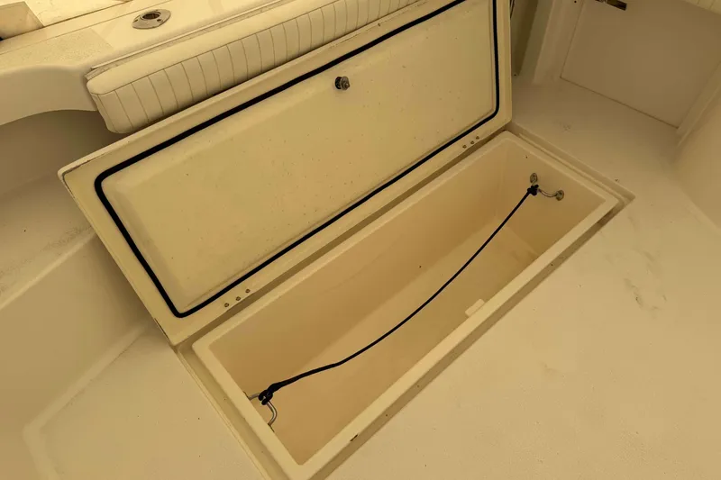 Slide: The Image of Open storage compartment on 2008 Henriques 30 Express boat deck. - 5