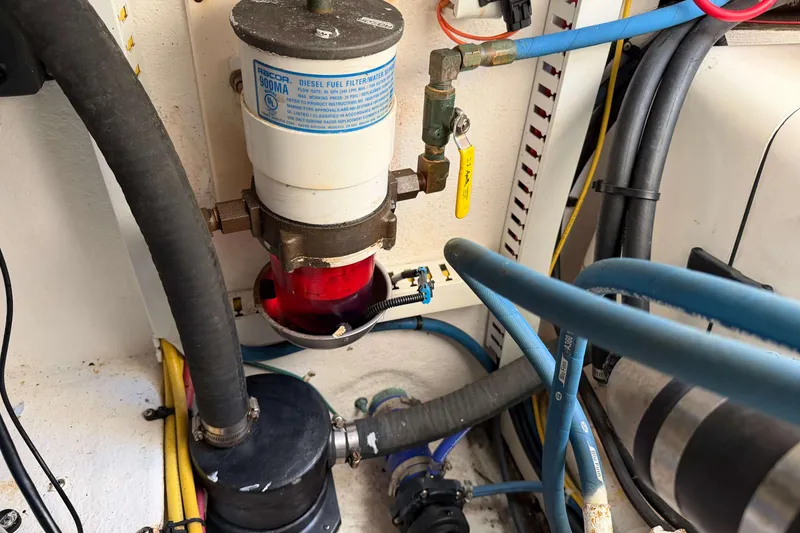 Slide: The Image of Engine room of 2008 Henriques 30 Express with diesel fuel filter system. - 84