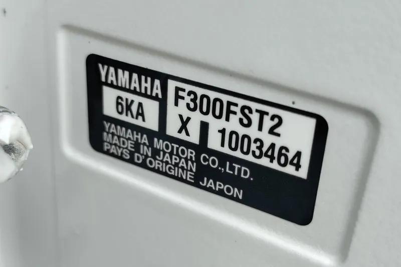 Slide: The Image of Yamaha motor label on 2013 Jupiter 38 Cuddy, model F300FST2, made in Japan. - 10