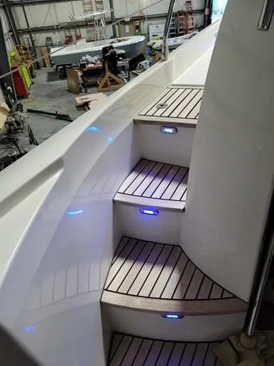 Slide: The Image of Illuminated staircase on a 2016 Prestige 560 yacht. - 13