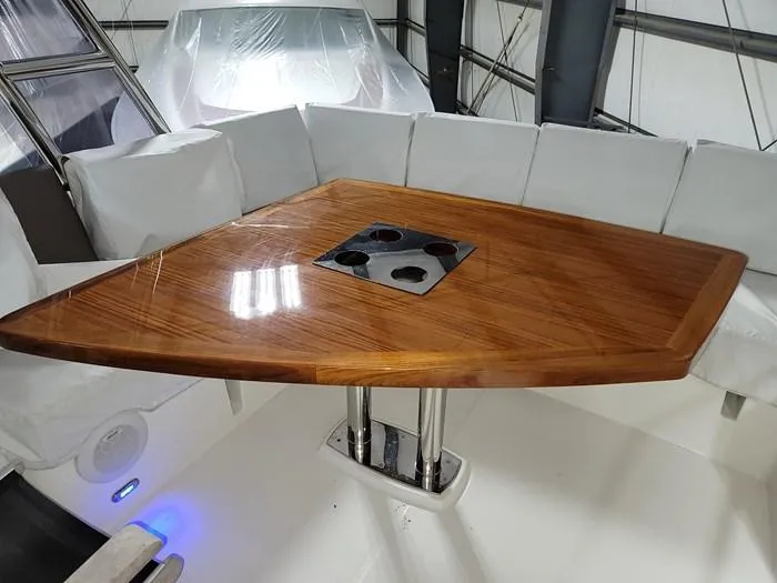 Slide: The Image of Luxurious wooden table on a 2016 Prestige 560 yacht. - 15