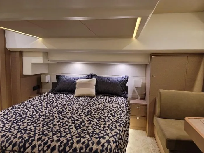 Slide: The Image of Luxurious bedroom on a 2016 Prestige 560 yacht. - 21