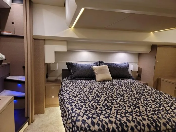 Slide: The Image of Luxurious bedroom on a 2016 Prestige 560 yacht. - 23