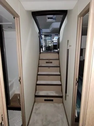 Slide: The Image of Interior stairs of 2016 Prestige 560 yacht. - 29